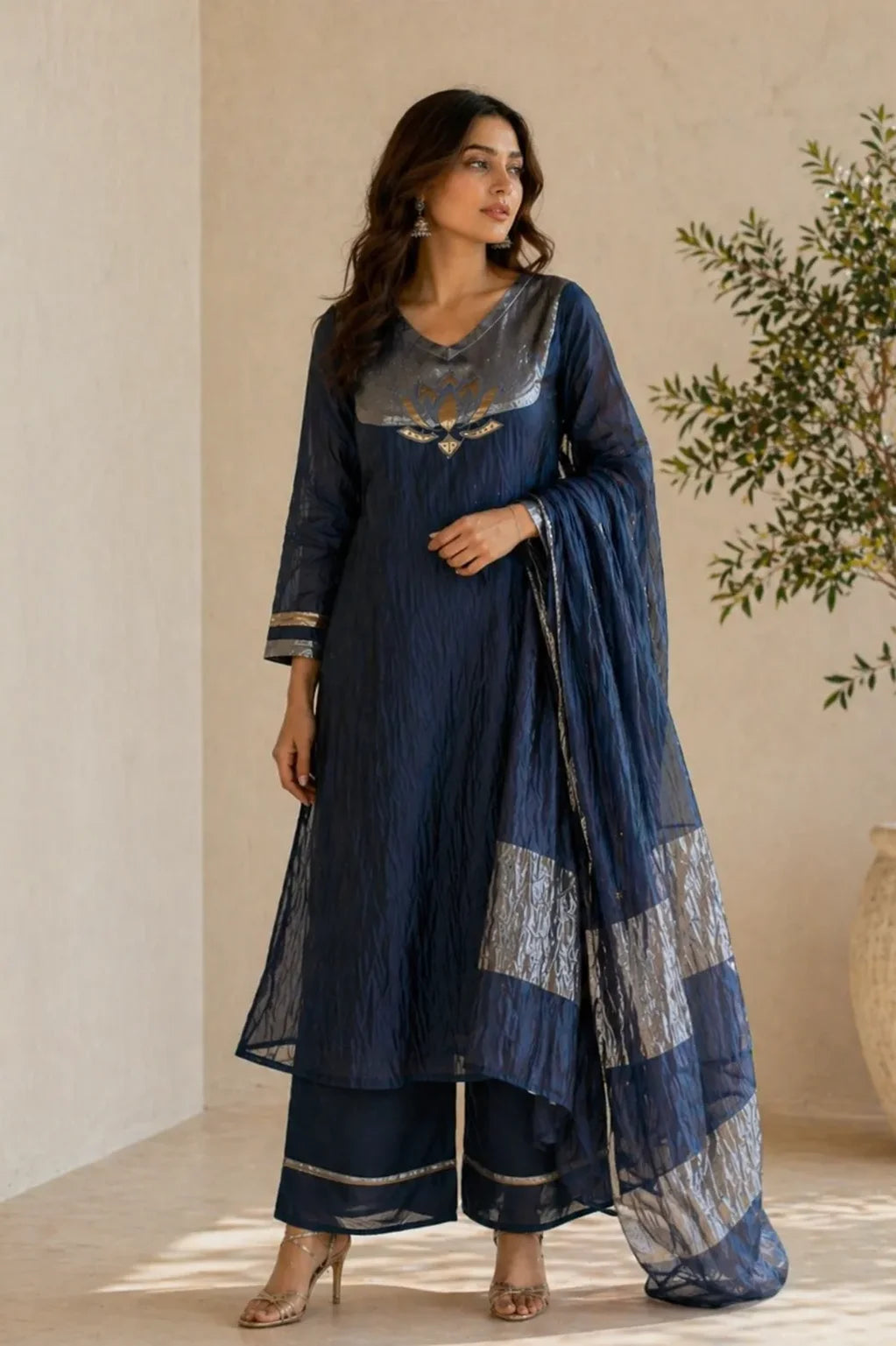 Midnight blue Neel Kamal mul chanderi A-line suit set with gold detail — back view, RITAURA