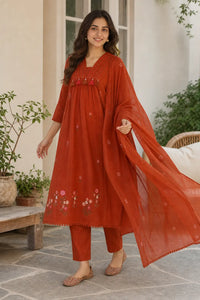 Warm rust Zariya mul cotton suit set with delicate detailing — back view, RITAURA