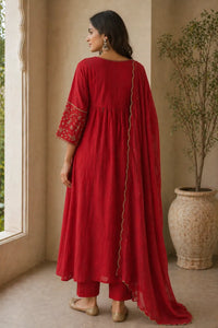 Red Aabha mul chanderi A-line suit set with gold neckline — close-up of weave and embroidery detail, RITAURA