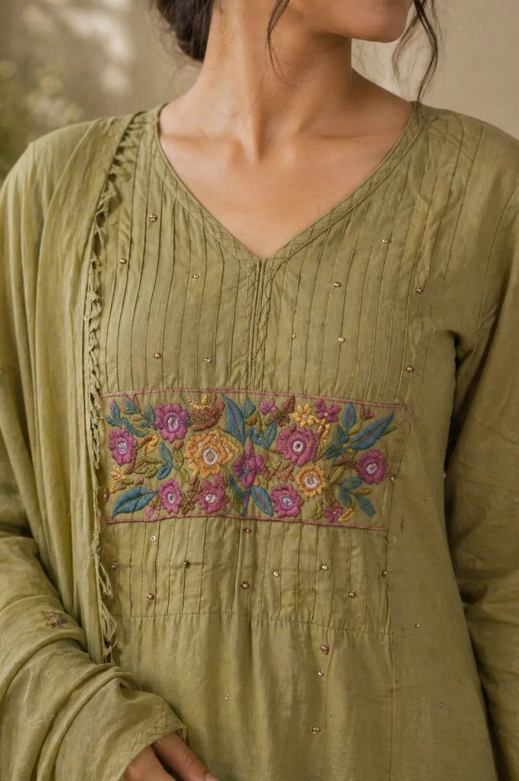 Muted olive pure cotton suit set with thread work — back view, RITAURA