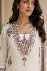 Brown Nayra pure cotton suit set with printed Anarkali silhouette — close-up of weave and embroidery detail, RITAURA