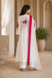 Ivory Aarini mul chanderi A-line suit set with floral sleeve embroidery — styled look on model, RITAURA