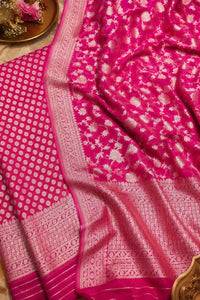 Rani pink zari georgette Banarasi suit set with fluid drape — front view, RITAURA