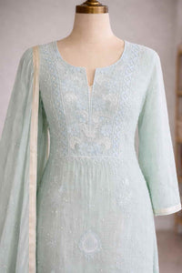 Soft mint Aabroo mul mul Chikankari unstitched set — back view, RITAURA