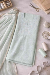 Soft mint Aabroo mul mul Chikankari unstitched set — close-up of weave and embroidery detail, RITAURA