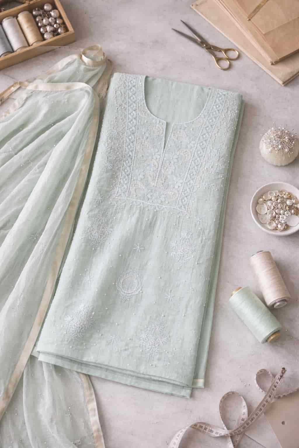 Soft mint Aabroo mul mul Chikankari unstitched set — close-up of weave and embroidery detail, RITAURA