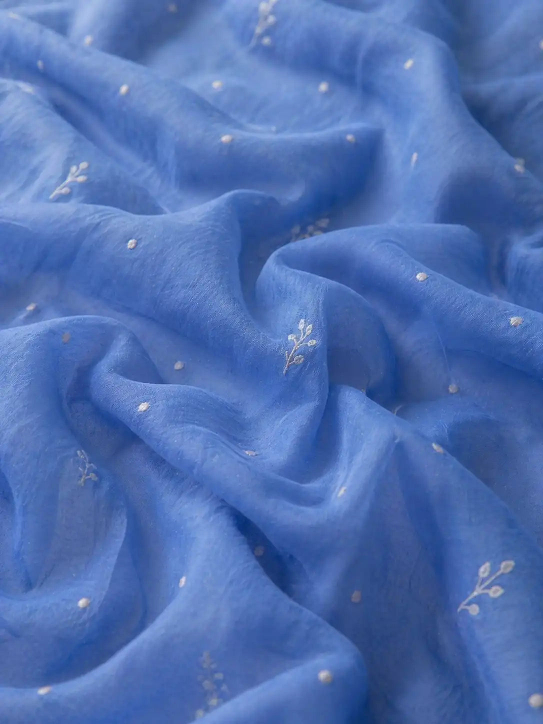Azure blue Neelaya mul mul Chikankari set with white floral embroidery — back view, RITAURA