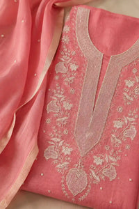 Coral pink Chikankari mal chanderi suit set with hand embroidery — close-up of weave and embroidery detail, RITAURA