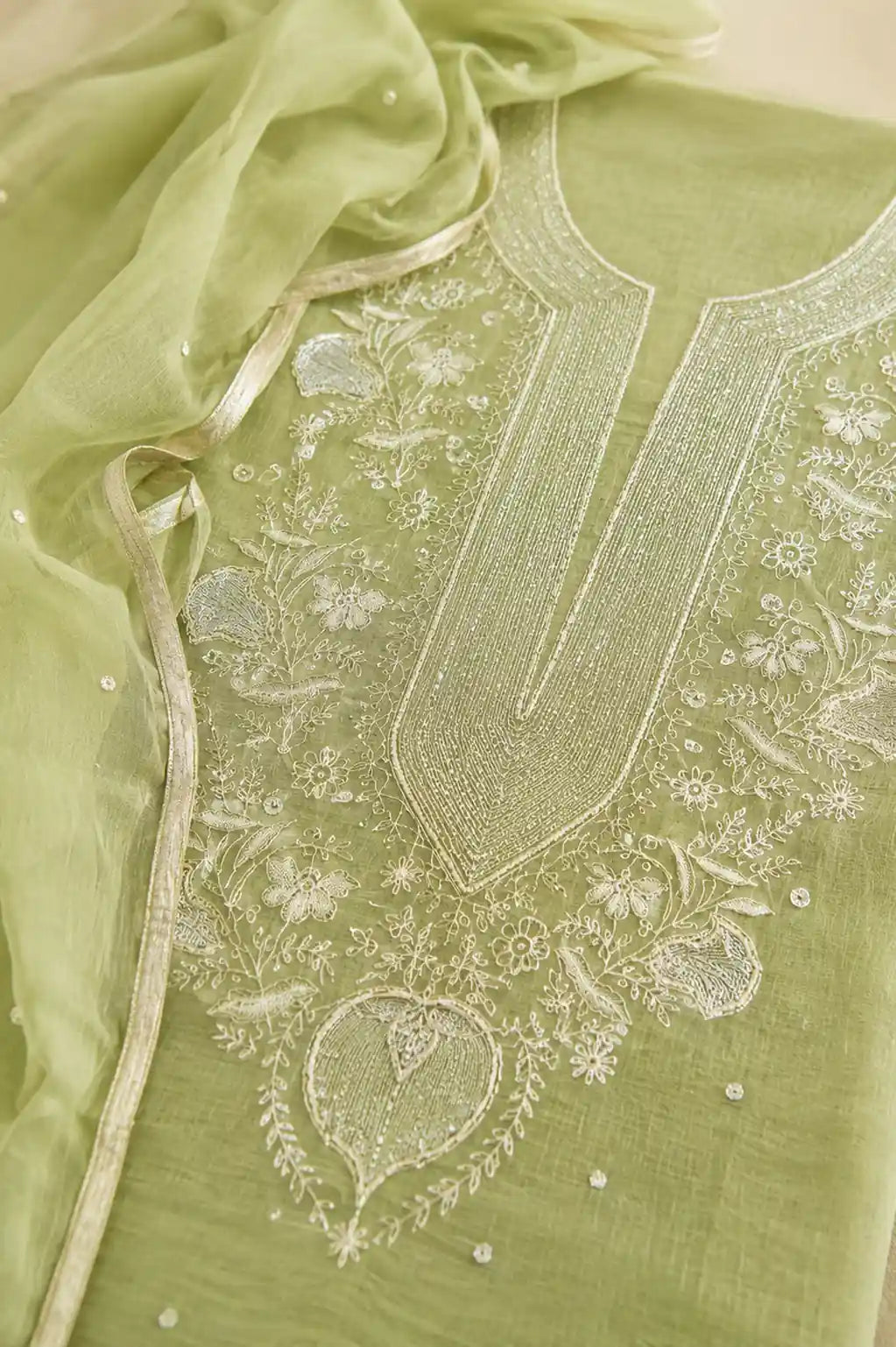Pistachio Noor Chikankari mal chanderi suit set with hand embroidery — close-up of weave and embroidery detail, RITAURA